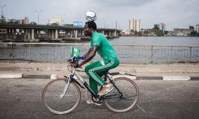 Harrison Chinedu rides 64 miles with a ball balanced on his head