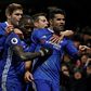 Chelsea's striker Diego Costa (R) gestures as he celebrates with teammates after scoring the opening goal of the English Premier League football match between Chelsea and Hull City at Stamford Bridge in London on January 22, 2017