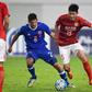 Zheng Wenzhao (C) of Guangzhou Evergrande competes for the ball with Josh Mitchell of Eastern FC during their AFC Champions League group stage football match in Guangzhou, China, on February 22, 2017