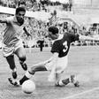 Brazilian soccer legend Mane Garrincha vies for the ball with Wales' Mel Hopkins in the World Cup quarter finals in June 1958