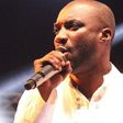 Kwabena Kwabena performing on stage