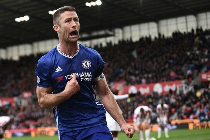 Chelsea's defender Gary Cahill celebrates after scoring during the English Premier League football match against Stoke City March 18, 2017