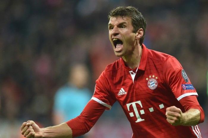 Bayern Munich's striker Thomas Mueller celebrates after the first goal during the UEFA Champions League group D football match FC Bayern Munich vs PSV Eindhoven in Munich, on October 19, 2016