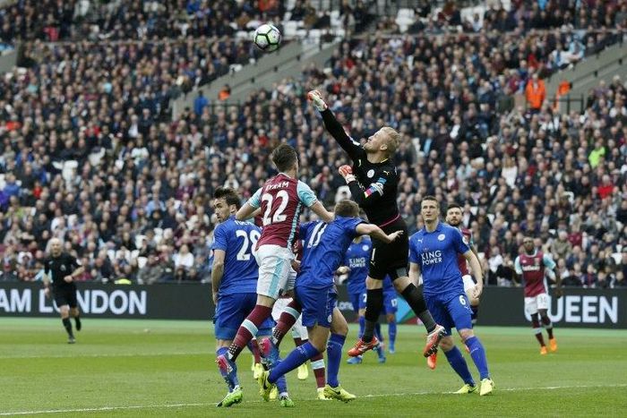 Leicester City's Kasper Schmeichel punches the ball away during the match against West Ham The London Stadium