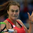 Belarus Aryna Sabalenka returnes a service to Dutch Michaella Krajicek during their Fed Cup match against in Minsk on February 12, 2017