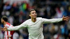 Real Madrid's forward Cristiano Ronaldo celebrates his second goal during the Spanish league football match against Real Sporting de Gijon November 26, 2016