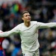 Real Madrid's forward Cristiano Ronaldo celebrates his second goal during the Spanish league football match against Real Sporting de Gijon November 26, 2016