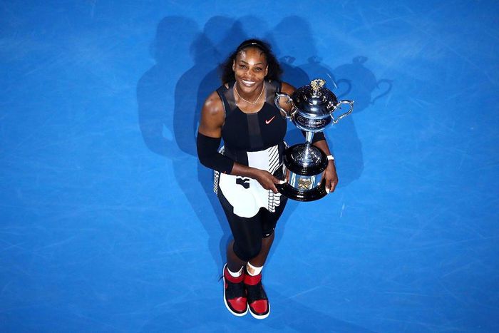 Serena Williams holds the Australian Open trophy.