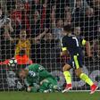Arsenal's Alexis Sanchez (R) scores the opening goal past Southampton's goalkeeper Fraser Forster during their English Premier League football match in Southampton, southern England on May 10, 2017