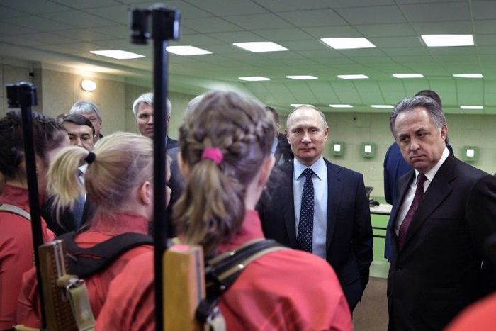 Russian President Vladimir Putin (2nd R) and Deputy Prime Minister Vitaly Mutko (R) visit the Academy of Biathlon in Krasnoyarsk on March 1, 2017.