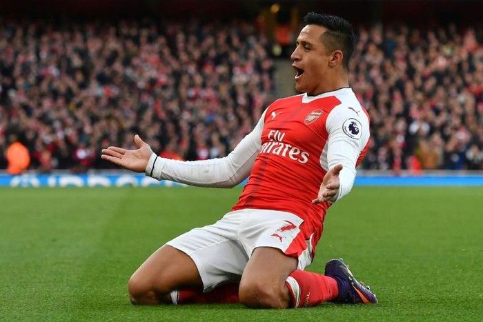 Arsenal's Alexis Sanchez celebrates scoring the opening goal in his team's 3-1 win over Bournemouth on November 27, 2016