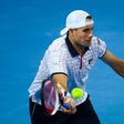 The US' John Isner hits a return to Australia's Nick Kyrgios in the world group quarter-final Davis Cup tennis match between Australia and the USA