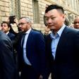 Han Li (R) and Marco Fassone (L), representatives of Chinese consortium Sino-Europe Sports (SES), arrive in Milan to finalize the deal with Fininvest for AC Milan's takeover by Rossoneri Sport Investment Lux on April 13, 201