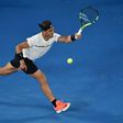 Spain's Rafael Nadal hits a return against France's Gael Monfils during their Australian Open fourth round match, in Melbourne, on January 23, 2017