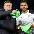 Leicester City's caretaker manager Craig Shakespeare (L) instructs defender Danny Simpson before their English Premier League match against Liverpool, at King Power Stadium in Leicester, on February 27, 2017