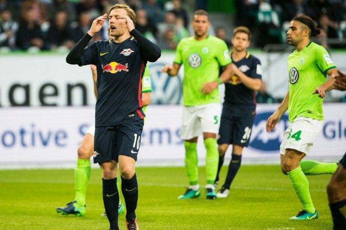 Emil Forsberg (left) groans after failing to convert a penalty for Leipzig at Wolfsburg on October 16, 2016