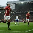 Manchester United's French striker Anthony Martial celebrates scoring their second goal during the English FA Cup third round football match between Manchester United and Reading at Old Trafford in Manchester, north west England, on January 7, 2017