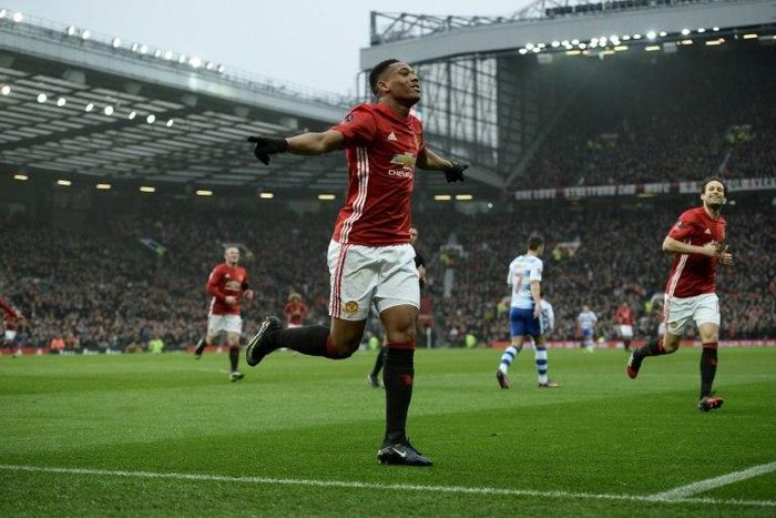 Manchester United's French striker Anthony Martial celebrates scoring their second goal during the English FA Cup third round football match between Manchester United and Reading at Old Trafford in Manchester, north west England, on January 7, 2017