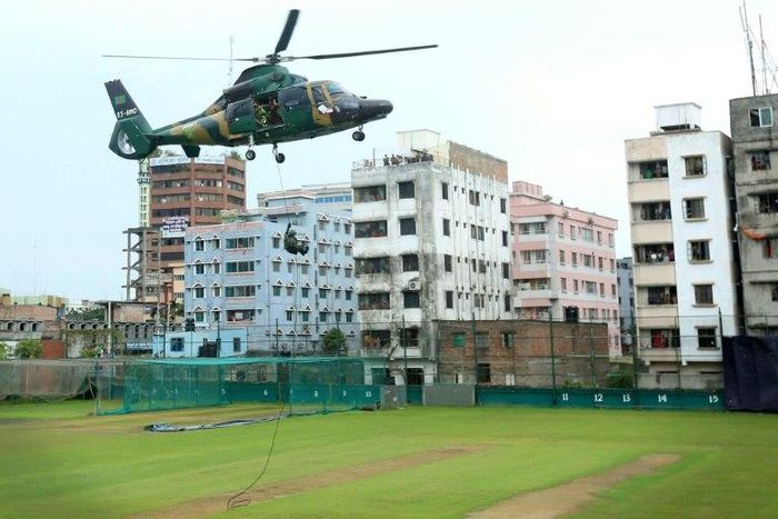 Commandos disembark from a helicopter during a war game at the Sher-e-Bangla National Stadium in Dhaka on October 6, 2016, a day before the first ODI cricket match between Bangladesh and the visiting England team