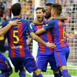 Barcelona's forward Lionel Messi (C) celebrates with teammates after scoring on October 22, 2016
