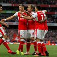 Arsenal's defender Hector Bellerin (L), seen celebrating a goal with teammates in September 2016, said he is "really, really happy" to have his contract extended with the English team