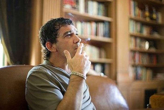 Antonio Banderas smoking a cigarette.