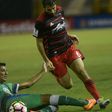 Diego Valeri of Portland Timbers (R) fights for the ball with Raul Gonzales of Salvadorean team C.D. Dragon during a CONCACAF Champions League football match in September