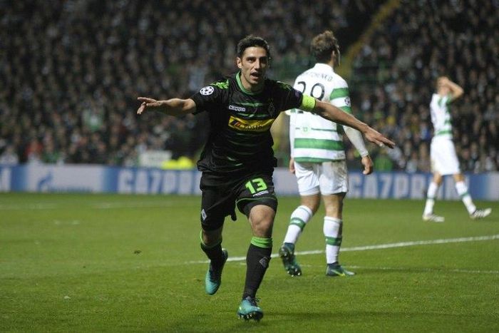 Monchengladbach's midfielder Lars Stindl celebrates scoring his team's first goal during the UEFA Champions League Group C football match between Celtic and Borussia Monchengladbach at Celtic Park stadium in Glasgow, Scotland on October 19, 2016