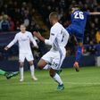 Leicester City's Riyad Mahrez (R) shoots past FC Copenhagen's goalkeeper Robin Olsen (L) to scores his team's first goal during at the King Power Stadium in Leicester, central England on October 18, 2016