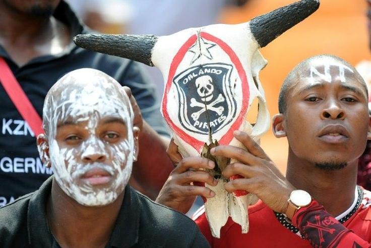Frustrated fans wearing Pirates' colours raced onto the Loftus Versfeld stadium field in Pretoria after 82 minutes of play during which their side took in 6 goals from the Mamelodi Sundowns