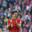 Bayern Munich's Robert Lewandowski reacts during their match against Borussia Dortmund in Munich, southern Germany, on April 8, 2017