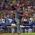 Welington Castillo of the Dominican Republic hits a 2 run single in the 11th inning during a Pool C game of the 2017 World Baseball Classic against Colombia at Miami Marlins Stadium on March 12, 2017