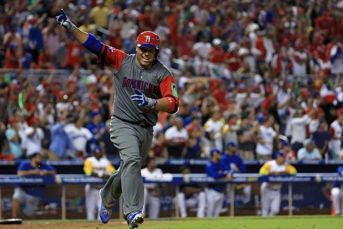 Welington Castillo of the Dominican Republic hits a 2 run single in the 11th inning during a Pool C game of the 2017 World Baseball Classic against Colombia at Miami Marlins Stadium on March 12, 2017