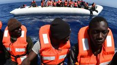 Migrants are rescued off the coast of Libya by SOS Mediterranee's Aquarius vessel in May 2016
