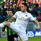 AC Milan's forward Lucas Ocampos controls the ball over Sassuolo's forward Antonino Ragusa (rear) during the Italian Serie A match Sassuolo vs AC Milan at the Mapei stadium in Reggio Emilia on February 26, 2017