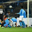 Real Madrid's defender Sergio Ramos (C) scores a second goal during the UEFA Champions League football match SSC Napoli vs Real Madrid on March 7, 2017 at the San Paolo stadium in Naples