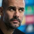 Manchester City's Spanish manager Pep Guardiola addresses the media during a press conference ahead of their UEFA Champions League match against Barcelona