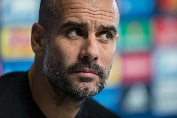 Pep Guardiola addresses the media at the City Football Academy in Manchester on October 31, on the eve of his side's Champions League match against Barcelona