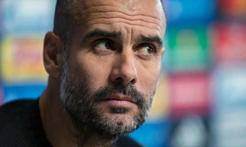 Manchester City's Spanish manager Pep Guardiola addresses the media during a press conference ahead of their UEFA Champions League match against Barcelona