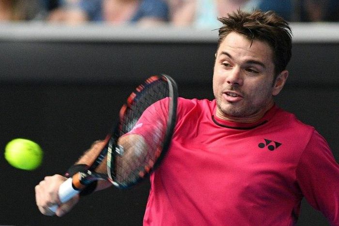 Switzerland's Stan Wawrinka in action against Martin Klizan of Slovakia in the first round of the Australian Open in Melbourne on January 16, 2017