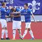 Darmstadt's defender Junior Diaz (C) celebrates scoring during the German first division Bundesliga football match against Borussia Dortmund February 11, 2017