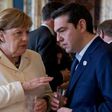 German Chancellor Angela Merkel speaks with Greek Prime Minister Alexis Tsipras during the 60th anniversary of the Traety of Rome, on March 25, 2017