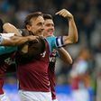 West Ham United's Swiss midfielder Edimilson Fernandes (C) celebrates with teammates after scoring against Chelsea in east London on October 26, 2016