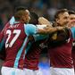 West Ham United's Swiss midfielder Edimilson Fernandes (C) celebrates with teammates after scoring against Chelsea in east London on October 26, 2016