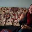 Afghan swimmer and coach Elena Saboori, head of the newly created Women's Swimming Committee, gestures as she speaks during an interview with AFP in a house in Kabul