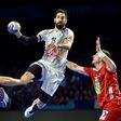 France's centre back Nikola Karabatic vies with Norway's pivot Bjarte Myrhol (R) during the 25th IHF Men's World Championship 2017 Group A handball match France vs Norway on January 15, 2017 at the Parc des Expositions in Nantes