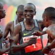 Kenyan Olympic gold medallist marathon runner Eliud Kipchoge (C) is one of three top runners selected by Nike to make the marathon record attempt later this year