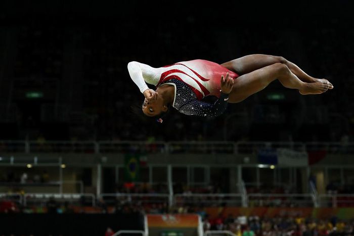 Simone Biles momentarily defeats gravity.