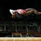 Simone Biles momentarily defeats gravity.