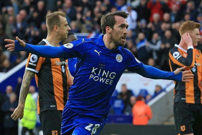 Leicester City's defender Christian Fuchs celebrates after scoring their first goal during the English Premier League football match against Hull City March 4, 2017